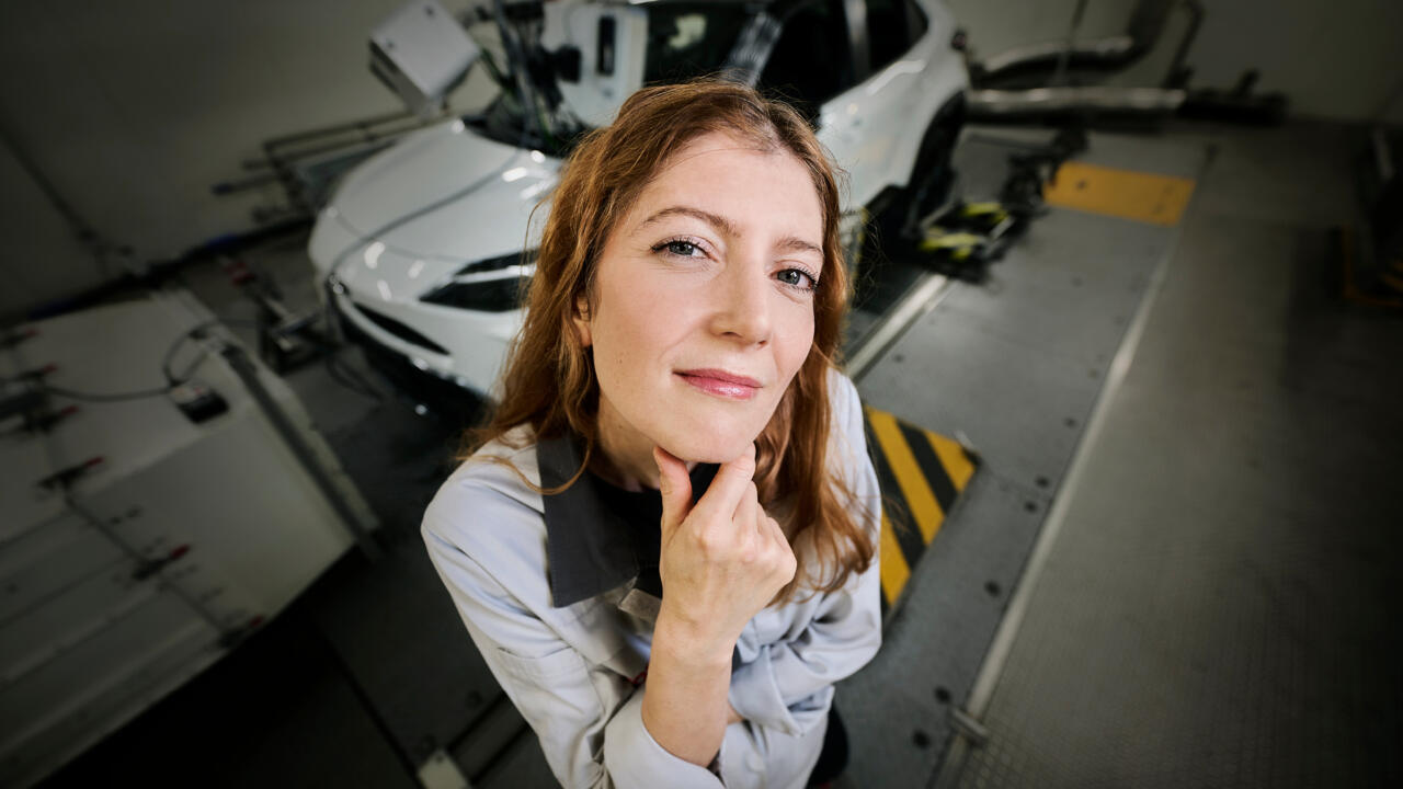 Young woman looking at the camera lens